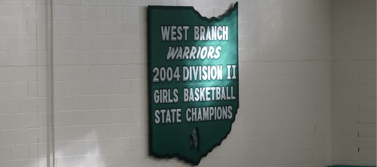 West Branch Warriors 2004 Division II Girls Basketball State Champions Plaque in Gym