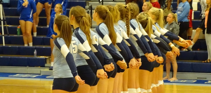 Louisville Leopards Varsity Volleyball Team 2017 Locking Hands for National Anthem