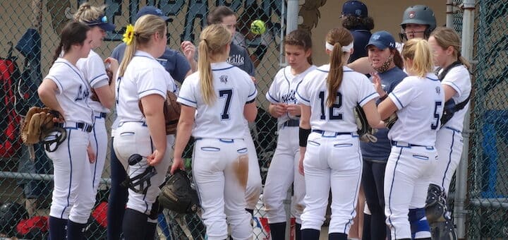 Louisville Leopards Softball Team Huddle Vs. Dover Tornadoes 2021