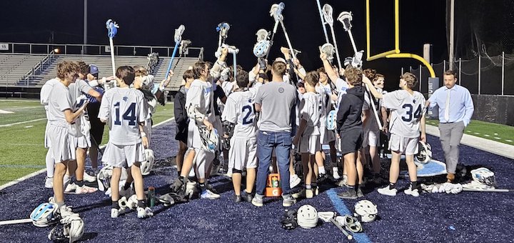 Louisville Leopards Boys Lacrosse Team 2024 Raising Sticks