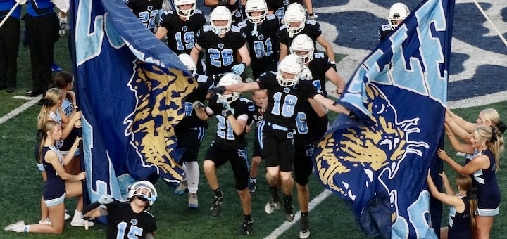 Louisville Leopards Running through Banner Before Playing Hoover 2025