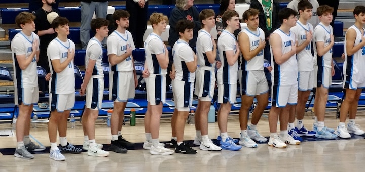 Louisville Leopards Boys Basketball Team During Anthem Vs. Northwest 2025