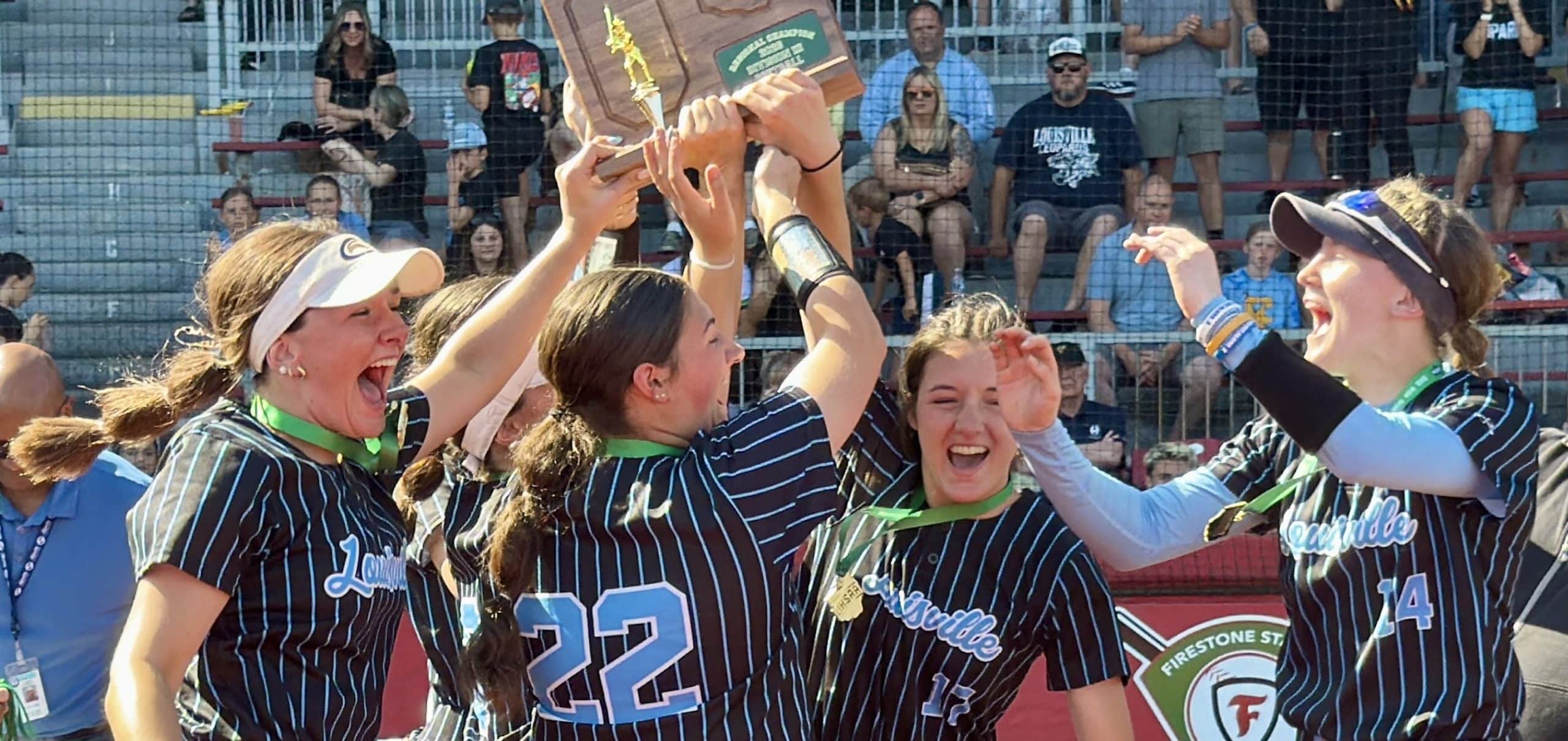 Louisville Leopards Softball Team with Regional Championship Plaque 2026